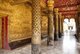 Laos: Golden bas-reliefs in the verandah at the entrance to the sim (ordination hall), Wat Mai Suwannaphumaham, Luang Prabang